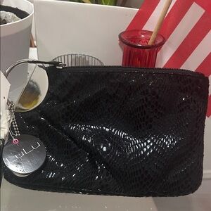 Elegant Black Snake Print Clutch